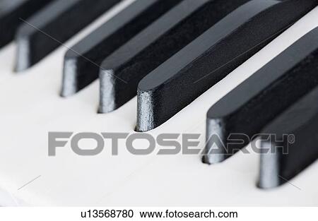 Stock Image - Close-up of piano keys. Fotosearch
