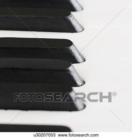 Stock Image - Close-up of piano keys. Fotosearch