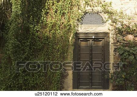 Closed door of a palace, Neemrana Fort, Neemrana, Alwar, Rajasthan, India View Large Photo Image Stock Image - Closed door of a palace, Neemrana Fort, Neemrana, Alwar, Rajasthan, India. Fotosearch