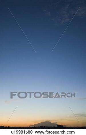Stock Image - Panoramic view of the horizon at dusk. Fotosearch