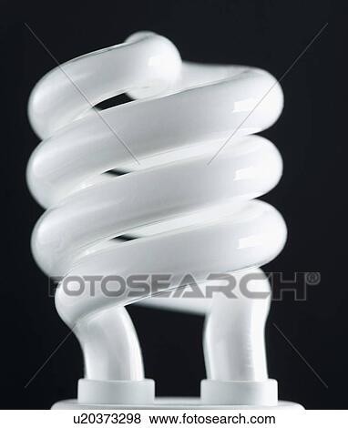 Close-up of a lit compact fluorescent light bulb View Large Photo Image Stock Photo - Close-up of a lit compact fluorescent light bulb. Fotosearch