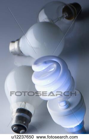 Stock Image - Close-up of compact fluorescent light bulbs. Fotosearch