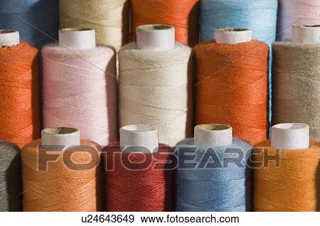 Stock Photo - Close-up of spools of thread. Fotosearch