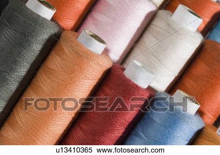 Stock Photography - Close-up of spools of thread. Fotosearch