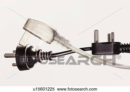 Stock Photography - Close-up of three electrical plugs. Fotosearch