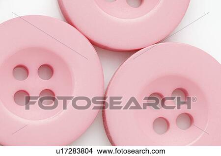 Close-up of three pink buttons View Large Photo Image Picture - Close-up of three pink buttons. Fotosearch