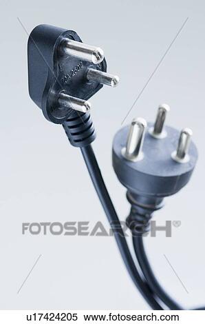 Stock Photography - Close-up of two electric plugs. Fotosearch