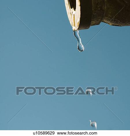 Stock Photo - Water dripping from a faucet. Fotosearch
