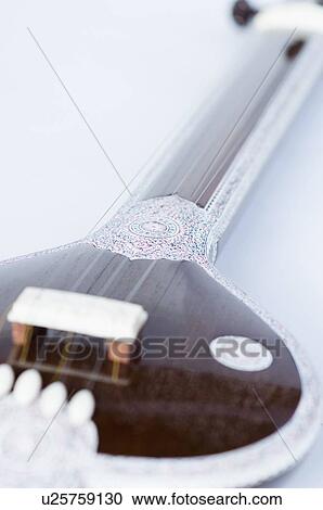 Stock Image - Close-up of a sitar. Fotosearch