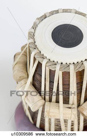 Close-up of a tabla View Large Photo Image Stock Photograph - Close-up of a tabla. Fotosearch