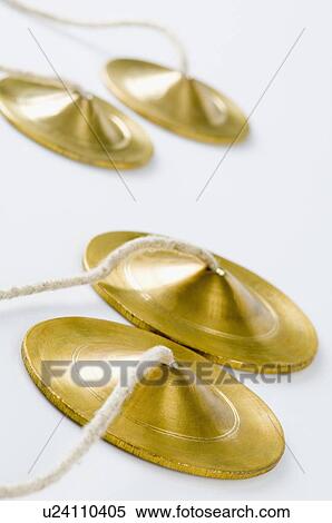 Stock Photography - Close-up of two manjiras. Fotosearch