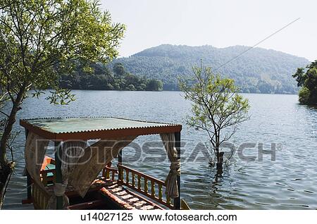 Stock Photography - High angle view of a boat in a lake. Fotosearch
