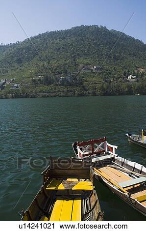 High angle view of boats docked at a lake View Large Photo Image Stock Image - High angle view of boats docked at a lake. Fotosearch