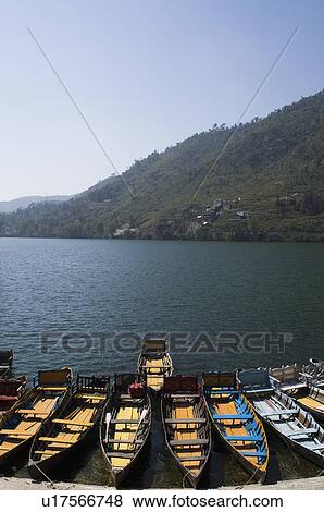 High angle view of boats docked at a lake View Large Photo Image Stock Photo - High angle view of boats docked at a lake. Fotosearch