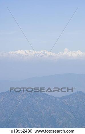 Panoramic view of a mountain range View Large Photo Image Stock Image - Panoramic view of a mountain range. Fotosearch