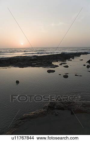 Picture - Sunrise over the sea. Fotosearch