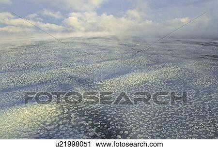 Grease ice and small pancake ice. Nearby Ross Island, Ross Sea, Antarctica. View Large Photo Image Stock Image - Grease ice and small pancake ice. Nearby Ross Island, Ross Sea, Antarctica.. Fotosearch