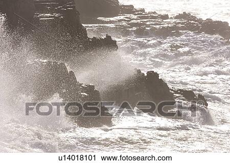 High angle view of surf breaking over rocks. Cape Peninsular, South Africa View Large Photo Image Stock Image - High angle view of surf breaking over rocks. Cape Peninsular, South Africa. Fotosearch