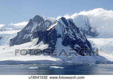 Stock Image - Iceberg in foreground. Arctowski Peninsula, Antarctica. Fotosearch