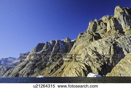 Stock Photography - Rockwalls in ÿ-Fjord. Scoresbysund, East Greenland. Fotosearch