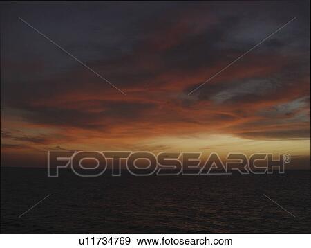 Stock Photo - The famous colours of a Red Sea Sunset. Red Sea. Egypt.. Fotosearch