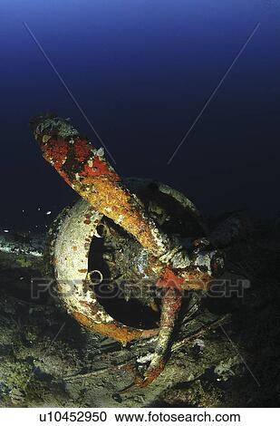 Stock Image - Remains of propeller and engine from wing of Blenheim Bomber, shot down during WWII, Malta, Maltese Islands, Mediterranean. Fotosearch