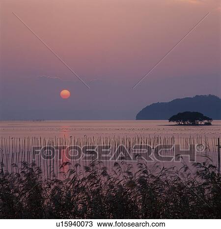 Stock Image - Sunset Over Lake Biwa. Fotosearch