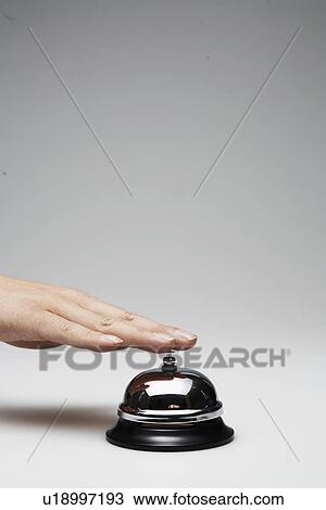 Person's Hand on Desk Bell View Large Photo Image Stock Image - Person's Hand on Desk Bell. Fotosearch