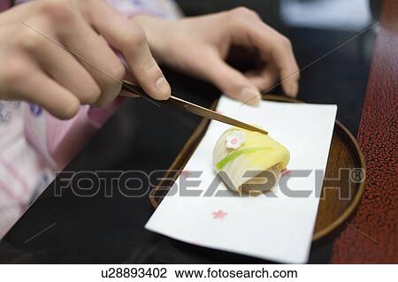 Woman in Yukata taking shi, side view, close up, Japan View Large Photo Image Stock Image - Woman in Yukata taking shi, side view, close up, Japan. Fotosearch