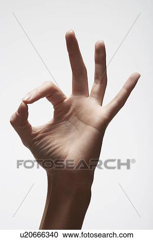 Woman's hand making 'OK' sign (close-up) View Large Photo Image Stock Image - Woman's hand making 'OK' sign (close-up). Fotosearch