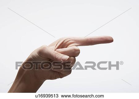 Stock Image - Woman's hand pointing (close-up). Fotosearch