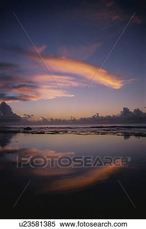Stock Photography - Sunset Reflected In The Sea. Fotosearch