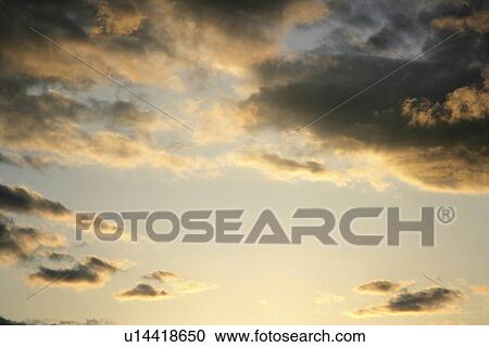 Stock Image - The Clouds Of Evening Glow. Fotosearch