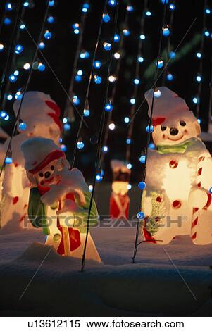 Stock Photography - Lights Near Snowmen. Fotosearch