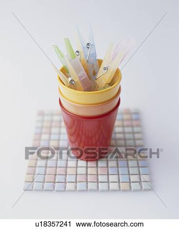 Stock Image - Clothespins In Plastic Cups. Fotosearch