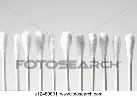 Cotton swabs in row View Large Photo Image Stock Image - Cotton swabs in row. Fotosearch