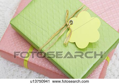 Stock Image - Gifts with tags (close-up). Fotosearch