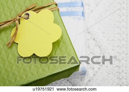 Stock Image - Gifts with tags (close-up). Fotosearch