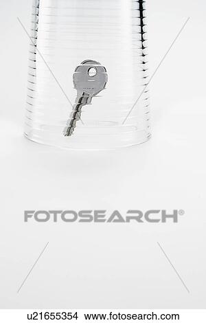 Key under Glass View Large Photo Image Picture - Key under Glass. Fotosearch