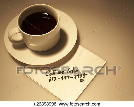 Stock Photograph - Message on Napkin Beside Coffee Cup. Fotosearch