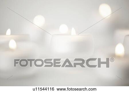 Tea lights View Large Photo Image Stock Photograph - Tea lights. Fotosearch