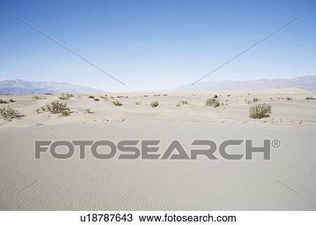 Stock Image - Empty highway in desert, Death Valley, California, USA. Fotosearch