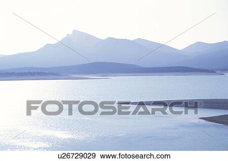 Stock Photo - The Canadian Rockies And A Lake. Fotosearch