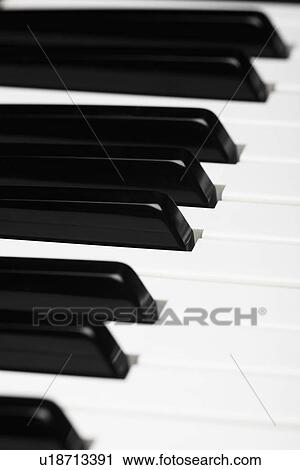 Close-up of piano keys View Large Photo Image Stock Image - Close-up of piano keys. Fotosearch