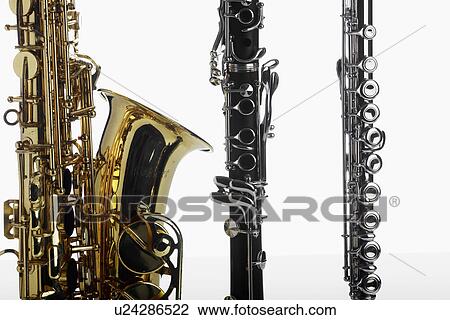Stock Image - Saxophone, clarinet and flute. Fotosearch