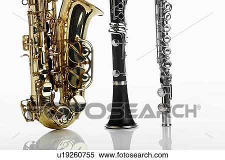 Stock Photography - Saxophone, clarinet and flute. Fotosearch