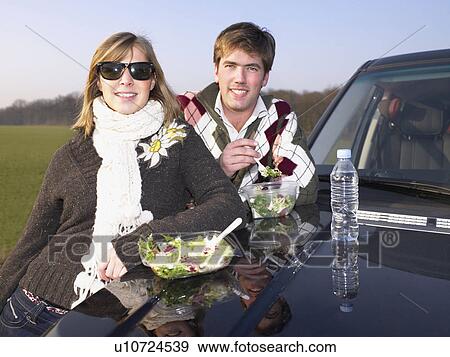 Stock Photo - Couple at rest stop. Fotosearch
