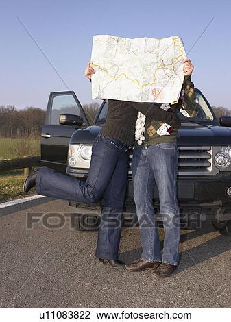 Couple behind map View Large Photo Image Stock Image - Couple behind map. Fotosearch