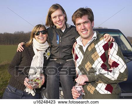 Group of friends at rest stop View Large Photo Image Stock Image - Group of friends at rest stop. Fotosearch