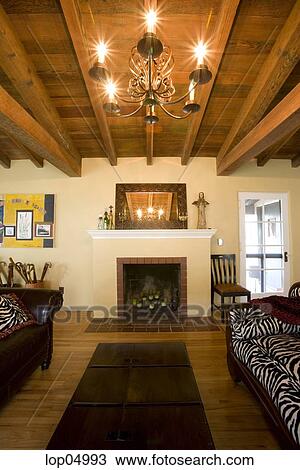 Cozy Rustic Living Room With Vaulted Wood Ceiling Stock